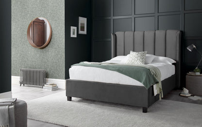 Aurora Velvet Ottoman Bed – Art Deco Winged Headboard with Foot-End Storage