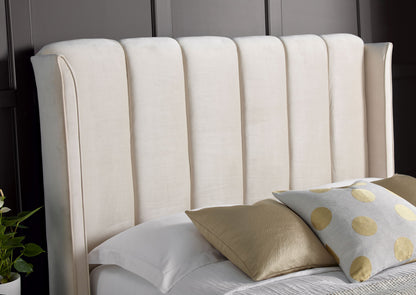Aurora Velvet Ottoman Bed – Art Deco Winged Headboard with Foot-End Storage